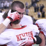 Senior Brandon Corkery consoles senior Jacob Newton after getting knocked out of the playoffs.