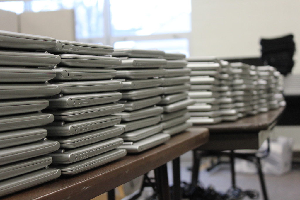 Chromebooks await distribution in the Media Center. Photo by Marissa Nunez.