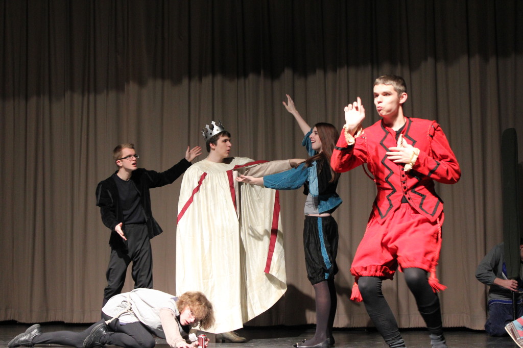 Narrator Carrsan Morrissey, right, talks about a scene with the dead king Claudius.